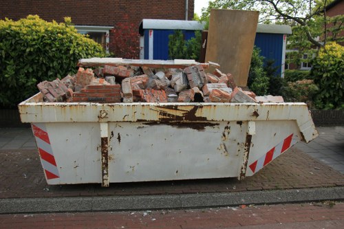 Construction site with waste removal services in Mill Hill